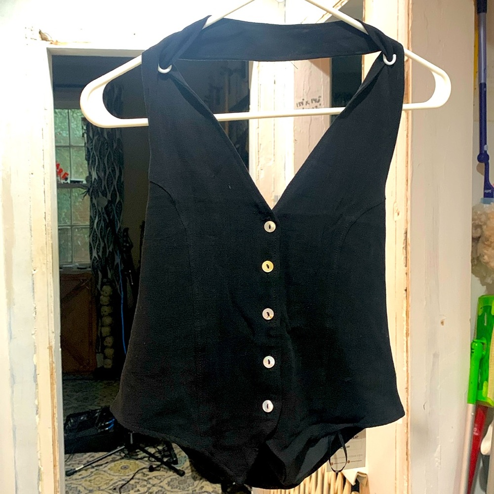 - Caraluna Boutique black linen vest